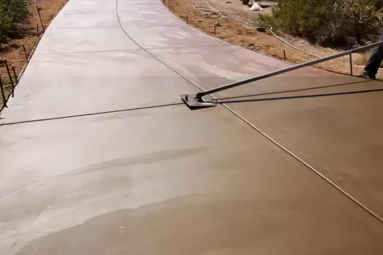 Smooth troweled concrete driveway surface with cut control joints, Brooksville, FL