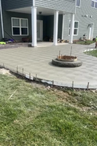 backyard concrete patio and firepit in brooksville florida